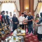 Gubernur Al Haris Umrohkan Orang Tua Peraih Emas PON Aceh–Sumut.