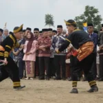 Kenduri Sko 5 Desa Tanjung Pauh Mudik: Bupati Monadi Ajak Warga Perangi Judi Online dan Narkoba