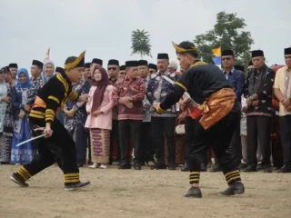 Kenduri Sko 5 Desa Tanjung Pauh Mudik: Bupati Monadi Ajak Warga Perangi Judi Online dan Narkoba