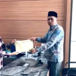 Fahrudin Bayar Denda Rp30 Juta Usai Bongkar Tiang Pembatas Jalan di Sungai Penuh